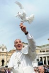 Pope Francis holds dove before his weekly audience at the Vatican